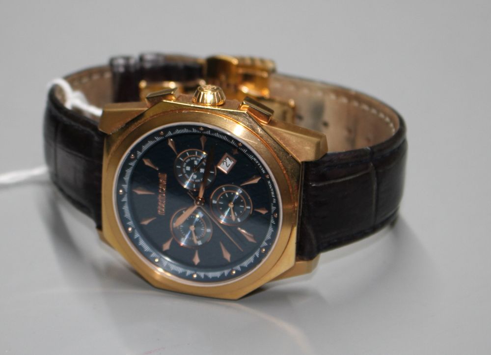 A gentlemans gilt steel Robert Cavalli quartz chronograph wrist watch, with box.